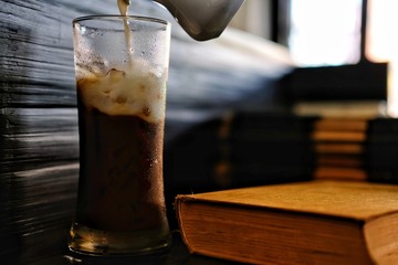 glass of iced coffee on table