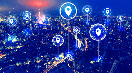 Map pins with aerial view of Tokyo, Japan at night
