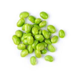 green soybeans seeds isolated on white background. top view