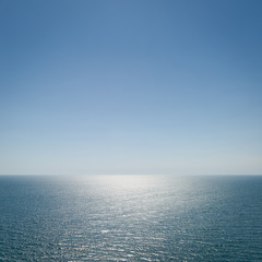 Only the sea under the blue sky. The view from the height. Square frame