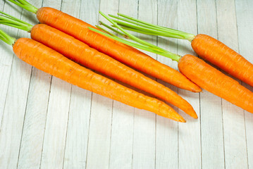 carrots on white wooden table