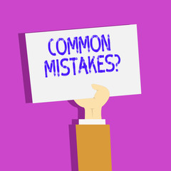 Conceptual hand writing showing Common Mistakes Question. Concept meaning repeat act or judgement misguided making something wrong Clipart of Hand Holding Up Sheet of Paper on Pastel Backdrop