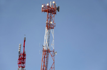 communication antenna tower with blue sky