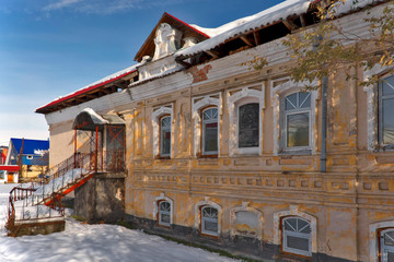 Fototapeta na wymiar Old manor house of the late 19th - early 20th century, Gorno-Altaisk, Siberia, Russia