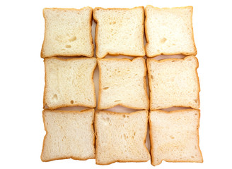 Heap of Stacked Sliced Bread on White Background.