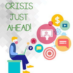 Text sign showing Crisis Just Ahead. Business photo showcasing Foresee failure take right action before it is late Man Sitting Down with Laptop on his Lap and SEO Driver Icons on Blank Space