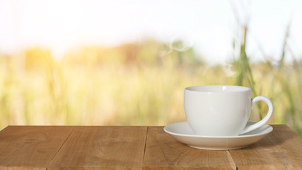 Coffee espresso on wood table nature background in garden,warm tone