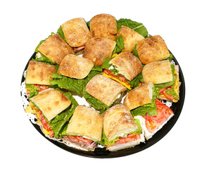 close up on fresh sandwich in the platter isolated on white background