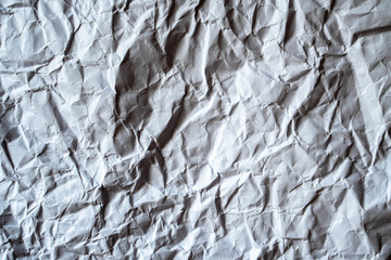 Obraz premium Crumpled white paper background