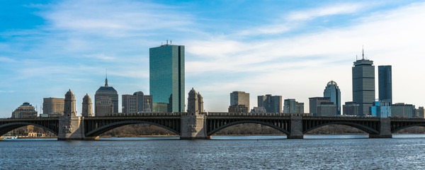 panorama for banner of Train running over the Longfellow Bridge the charles river at the evening...