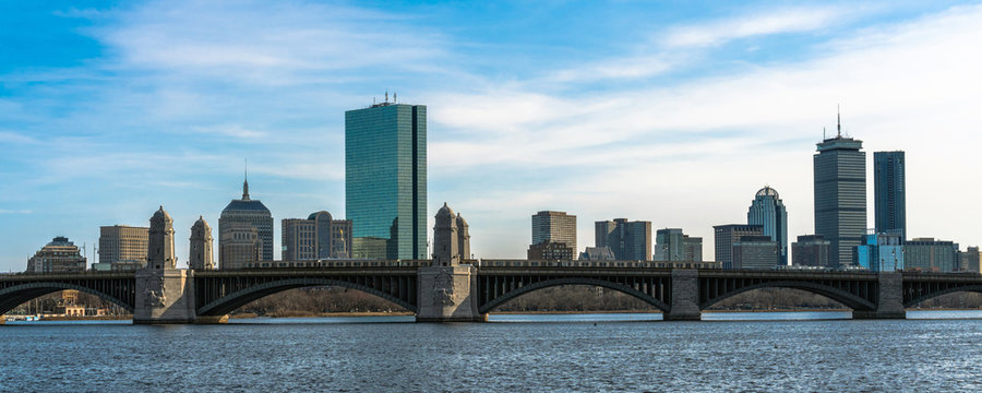 panorama for banner of Train running over the Longfellow Bridge the charles river at the evening time, USA downtown skyline, Architecture and building with transportation concept