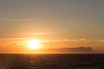 Fototapeta na wymiar Norwegian fjords with rocky horizon at sunrise