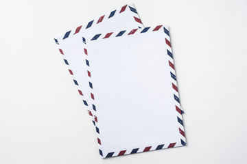 Fototapeta premium Top view of post envelope on white background