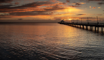 Fototapeta na wymiar Panoramic Pier Sunrise with Beautiful Sky