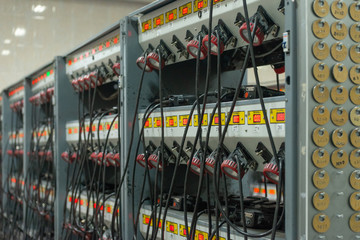 Rack with charging batteries for miner's helmets