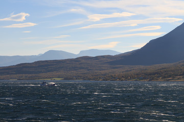 Norwegian fjords with rocky horizon at sunrise