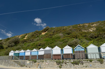 Beach huts along the promenade on the seafront at Bournemouth in Dorset