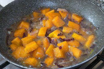 pumpkin diced stewed in pan