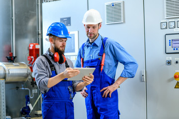 two worker in industrial plant