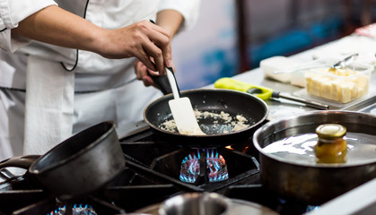 Chef cooking food in the kitchen, Chef preparing food