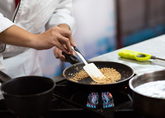 Chef cooking food in the kitchen, Chef preparing food