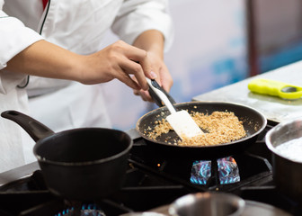 Chef cooking food in the kitchen, Chef preparing food