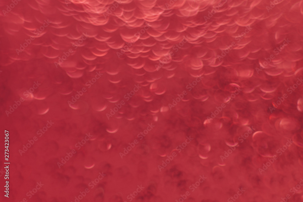 Poster beautiful red bokeh on a abstract background.