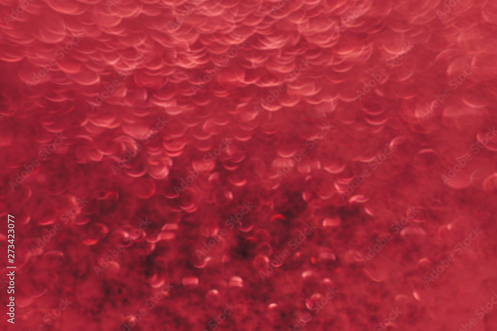 Poster beautiful red bokeh on a abstract background.