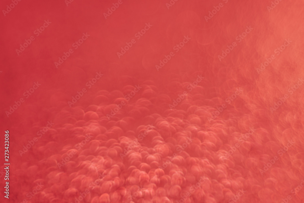 Poster beautiful red bokeh on a abstract background.