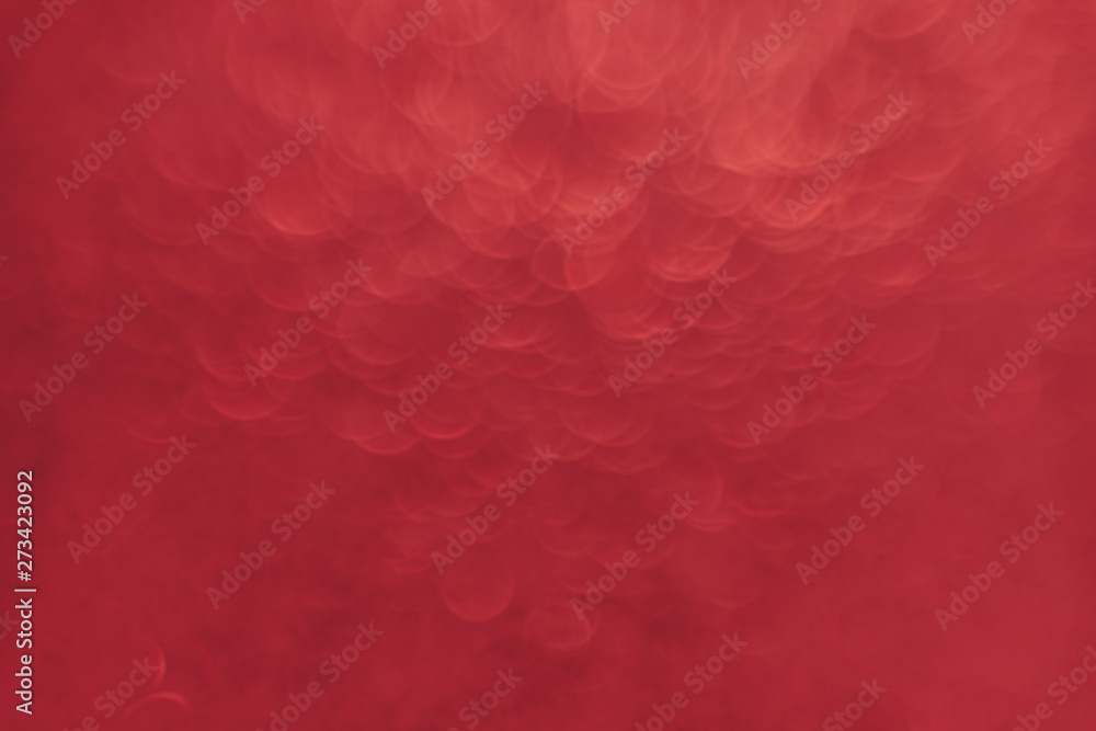 Poster beautiful red bokeh on a abstract background.