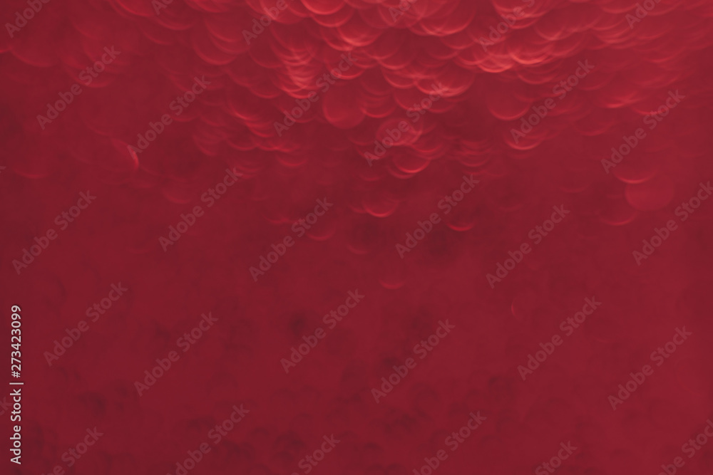 Poster Beautiful red bokeh on a abstract background.