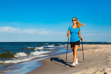 Nordic walking - young woman training