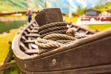 Old viking boat on fjord shore, Norway