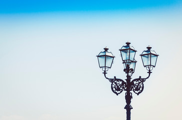Old street lamppost – vintage light on streets in Catania, Sicily, Italy.