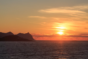 Fototapeta premium Norwegian fjords with rocky horizon at sunrise