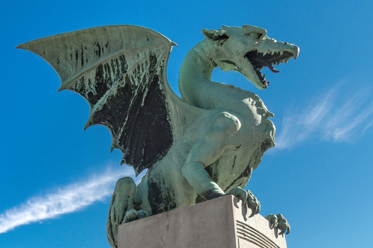 Side view of one of the sculptures depicting a Dragon from the Dragon Bridge, Ljubljana, Slovenia