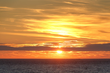 Obraz premium Fjord during sunset with rocky shores
