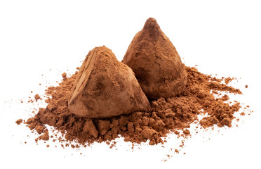 Chocolate truffles on cocoa powder isolated on white background