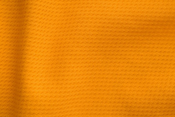 Orange color sports clothing fabric jersey football shirt texture top view