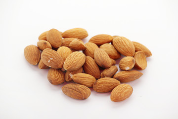 Pile of almond at white background