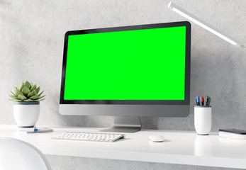 Fototapeta premium Modern black and silver computer on white desktop and concrete interior mockup 3D rendering