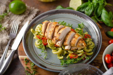 Homemade pesto pasta with grilled chicken