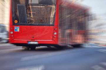 Public transportation / bus in urban surroundings on the street. © astrosystem