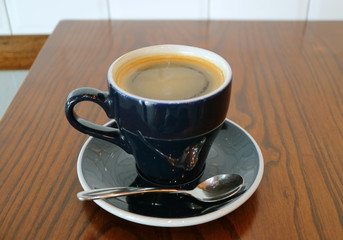  One Cup of Hot Coffee Isolated on Wooden Table