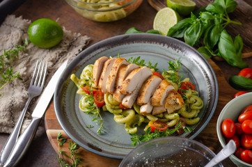 Homemade pesto pasta with grilled chicken
