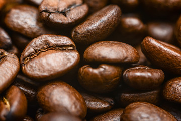 Coffee Beans Background. Close Up. Mixture of different kinds of coffee beans.