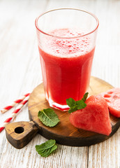 Watermelon smoothie and fresh watermelon