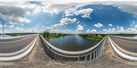 full seamless spherical hdri panorama 360 degrees  angle view on concrete bridge near asphalt road...