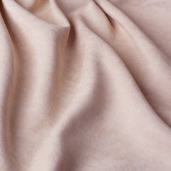 Monochrome decorative fabric velour light pink. Fabric with natural texture. Velour textiles. Cloth backdrop