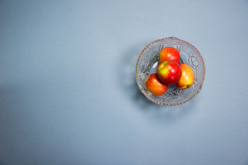 four apples in a bowl